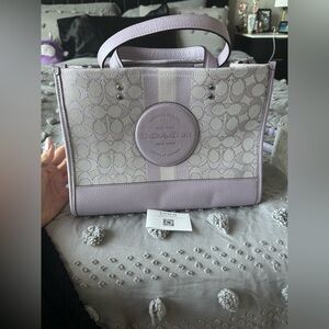 NWT - authentic purple Coach purse with strap